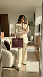 The signature Eggplant Tatreez Tote